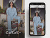 eda fashion model in blue outfit with mobile app display